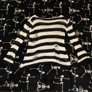 Black and white stripped ripped sweater